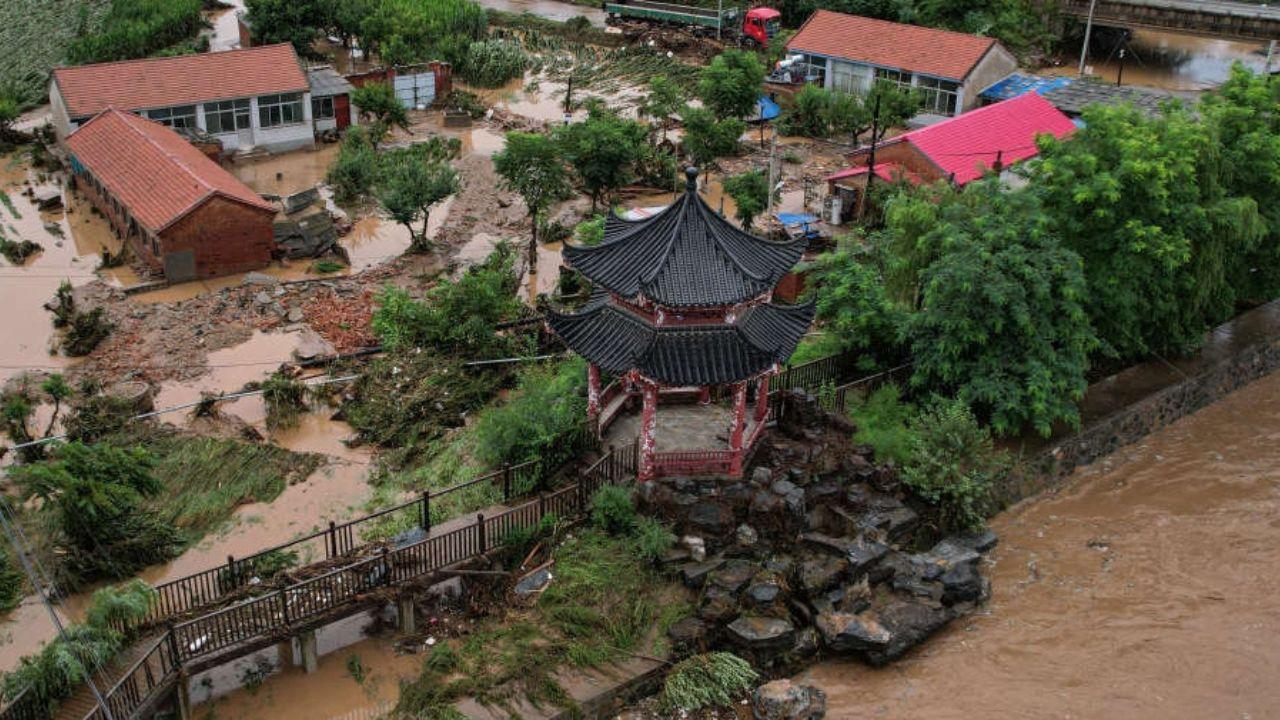 Heavy Rain Hits Beijing Floods Cause Deaths and Damage
