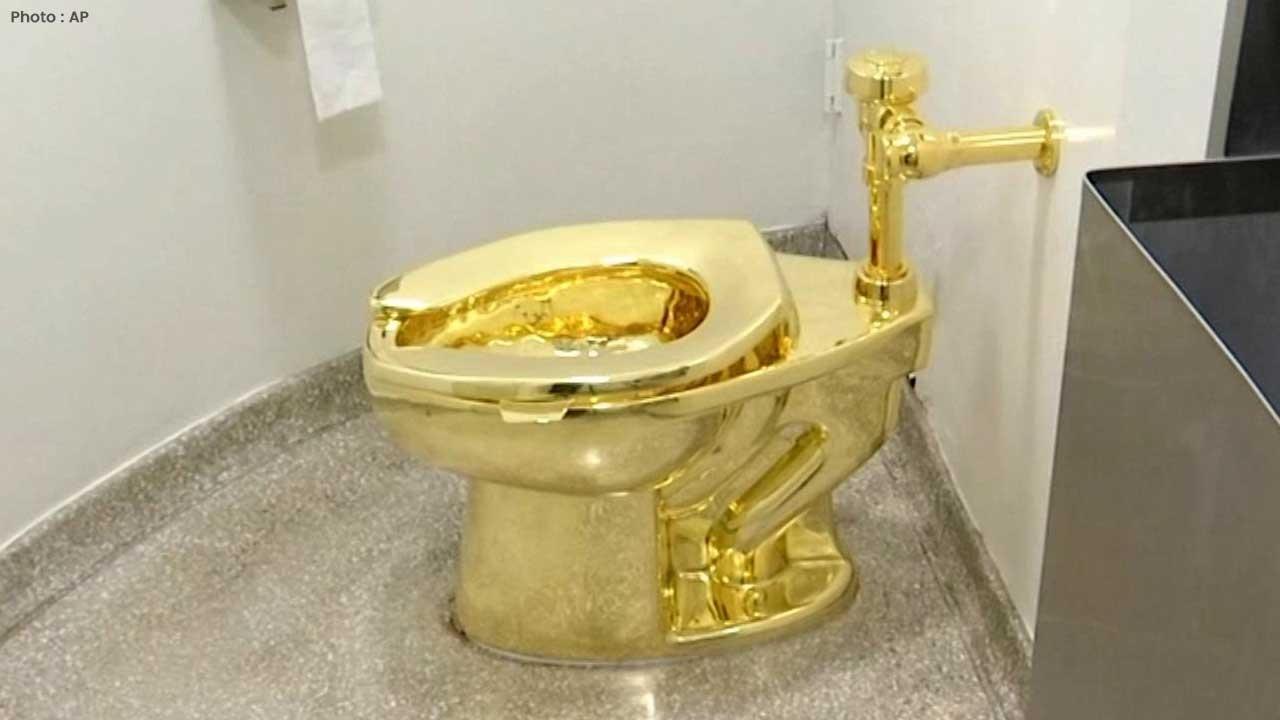 Gold Toilet 'America' Achieves $12.1M at Sotheby’s Auction in New York