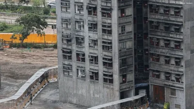 Hong Kong Fire Victims Return to Burned Homes Searching for Memories